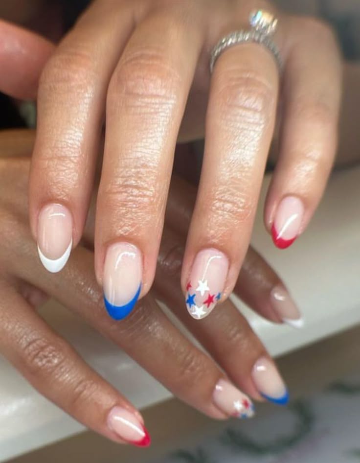 13 Subtle Fourth of July Nails That'll Make You the Star of the Celebration! - 12. Elegant Stripes with Star Accents