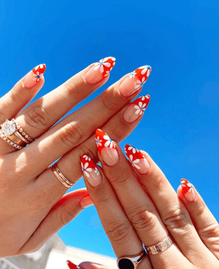 13 Subtle Fourth of July Nails That'll Make You the Star of the Celebration! - 3. Festive Waves in Red, White, and Blue