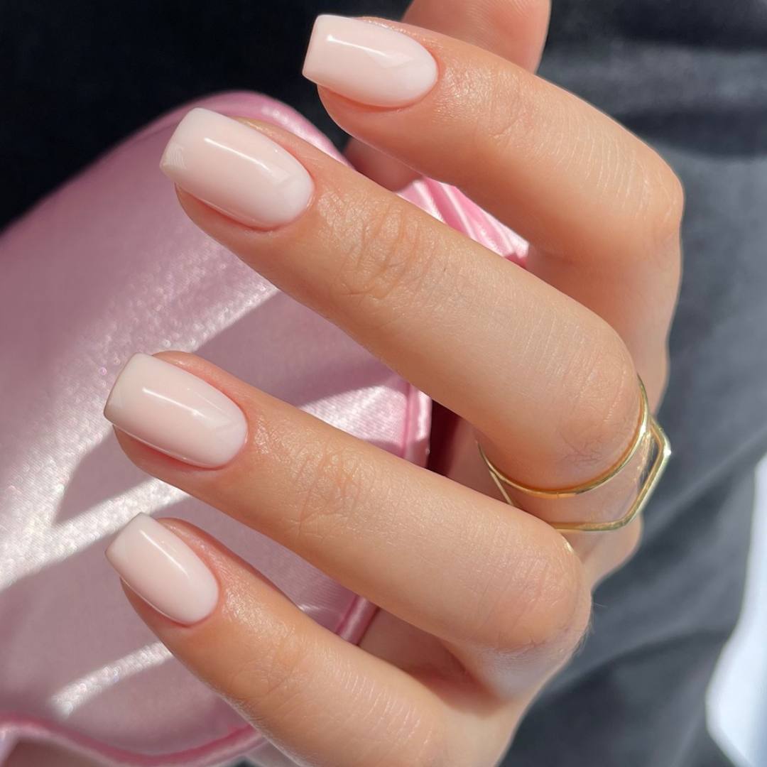 15 Chic American Manicure Nails Looks That Are Perfect for Any Occasion! - 5. Glossy Nude Finish