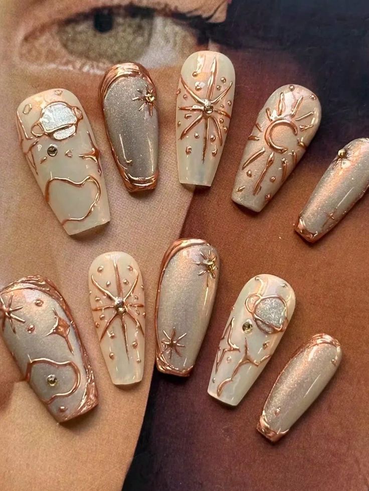 Discover the Art of Gold Leaf Nails: 7 Designs That Will Turn Heads! - Celestial Charm
