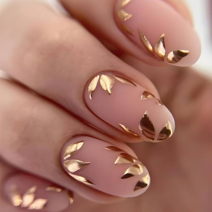 Discover the Art of Gold Leaf Nails: 7 Designs That Will Turn Heads! - Elegant Leaf Accents