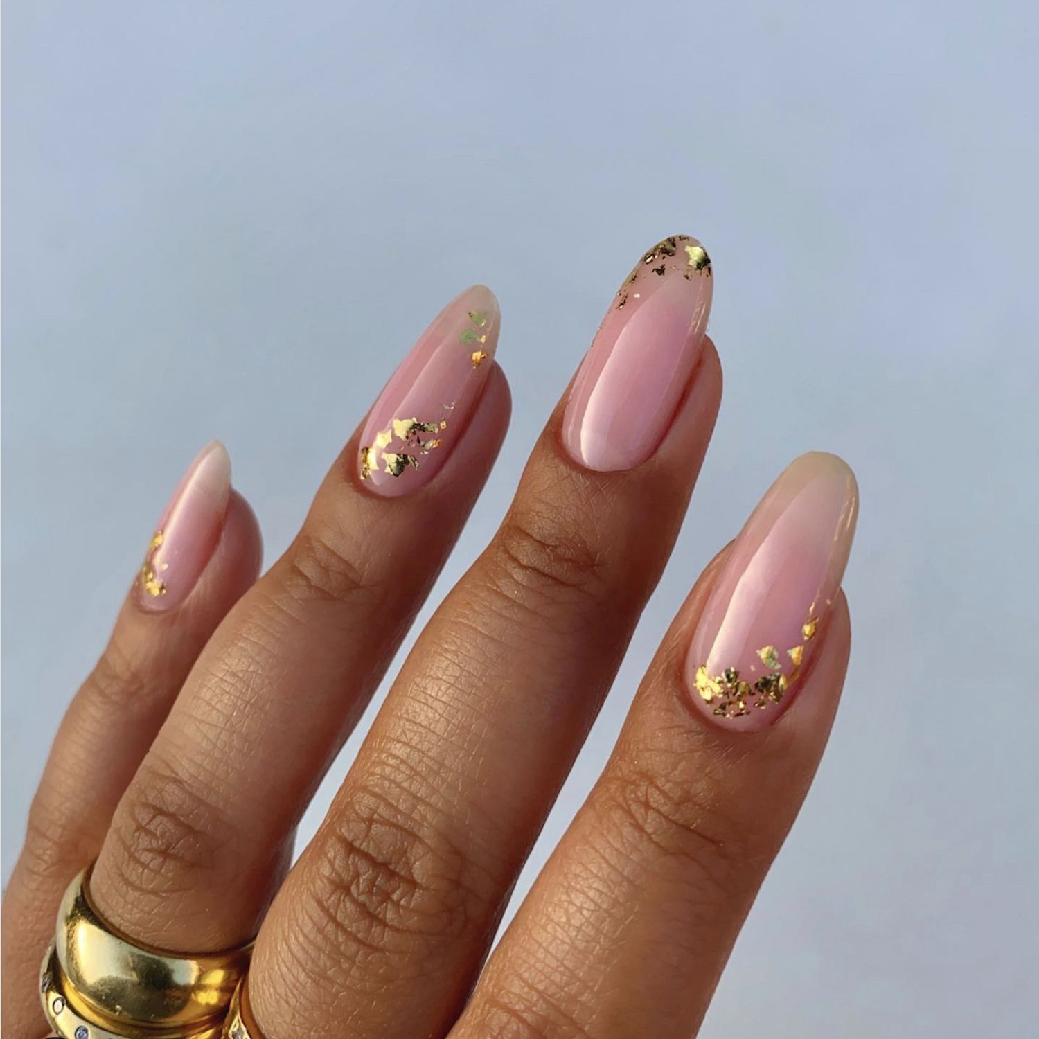 Discover the Art of Gold Leaf Nails: 7 Designs That Will Turn Heads! - Golden Glitter Explosion