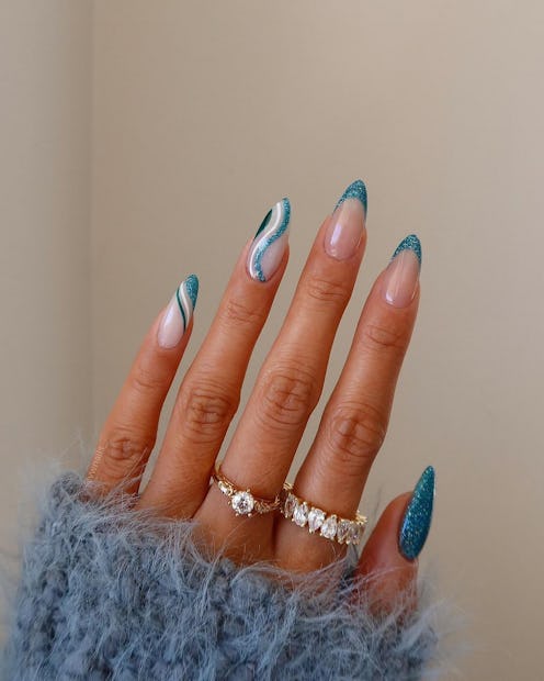 Icy Blue Nails Winter: 14 Irresistible Designs You Can't Miss! - Mystical Ocean: Icy Blue with Teal Swirls
