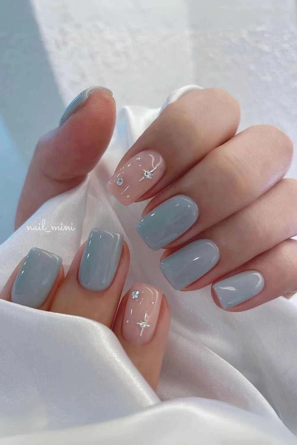 Icy Blue Nails Winter: 14 Irresistible Designs You Can't Miss! - Subtle Elegance: Icy Blue with Gray Accents