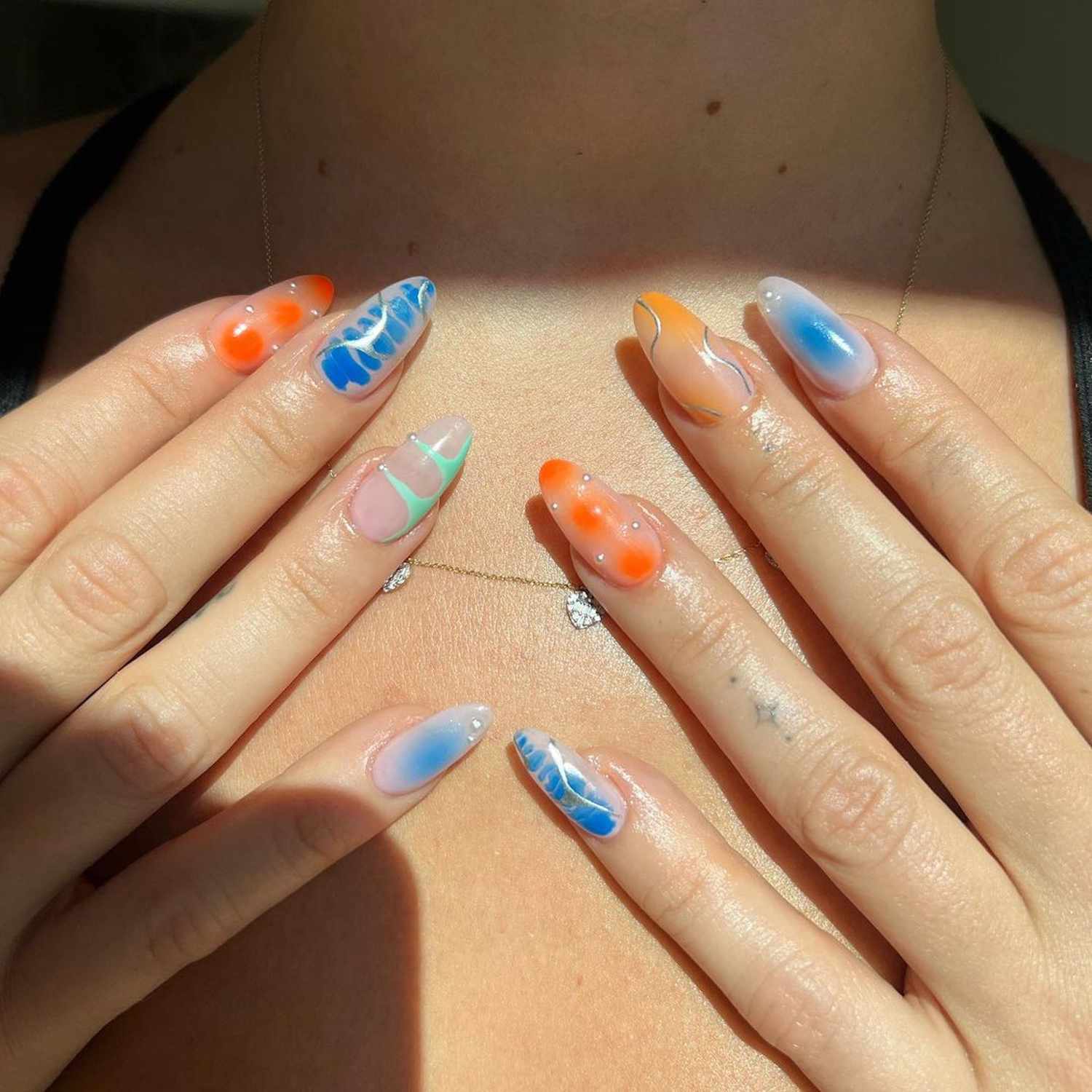 11 Bright & Trendy Summer Nail Inspo Ideas You Can't Miss This Season! - 4. Ocean Wave Inspiration