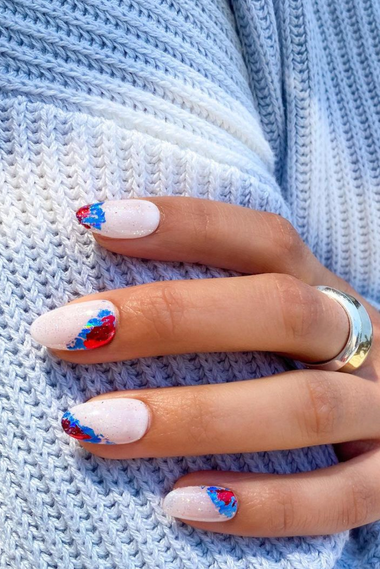 11 Subtle Fourth of July Nails That Feel Festive Without the Fuss - Abstract Red and Blue Swirls