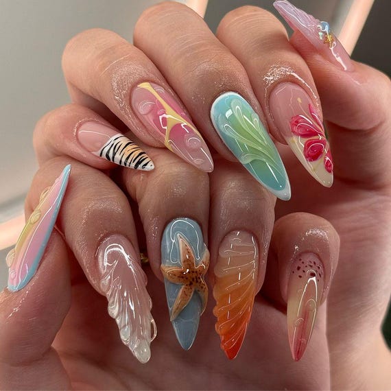 12 Tropical Jelly Nail Designs That Scream Summer Vibes - 4. Tropical Leaves