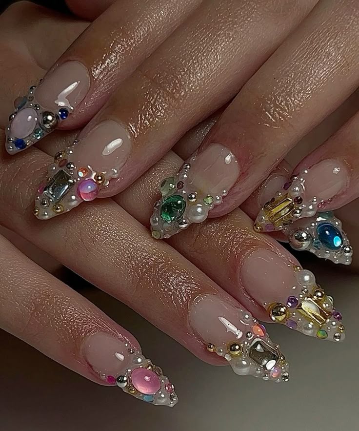 13 Almond Nails with Gems That Look Like Luxury on Your Fingertips - 1. Elegant Gem-Studded Almonds