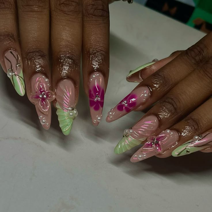 13 Almond Nails with Gems That Look Like Luxury on Your Fingertips - 2. Floral Elegance