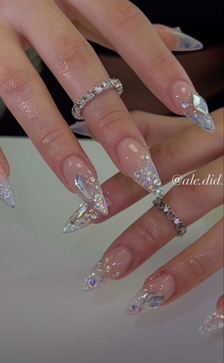 13 Almond Nails with Gems That Look Like Luxury on Your Fingertips - 3. Sparkling Silver and Gold