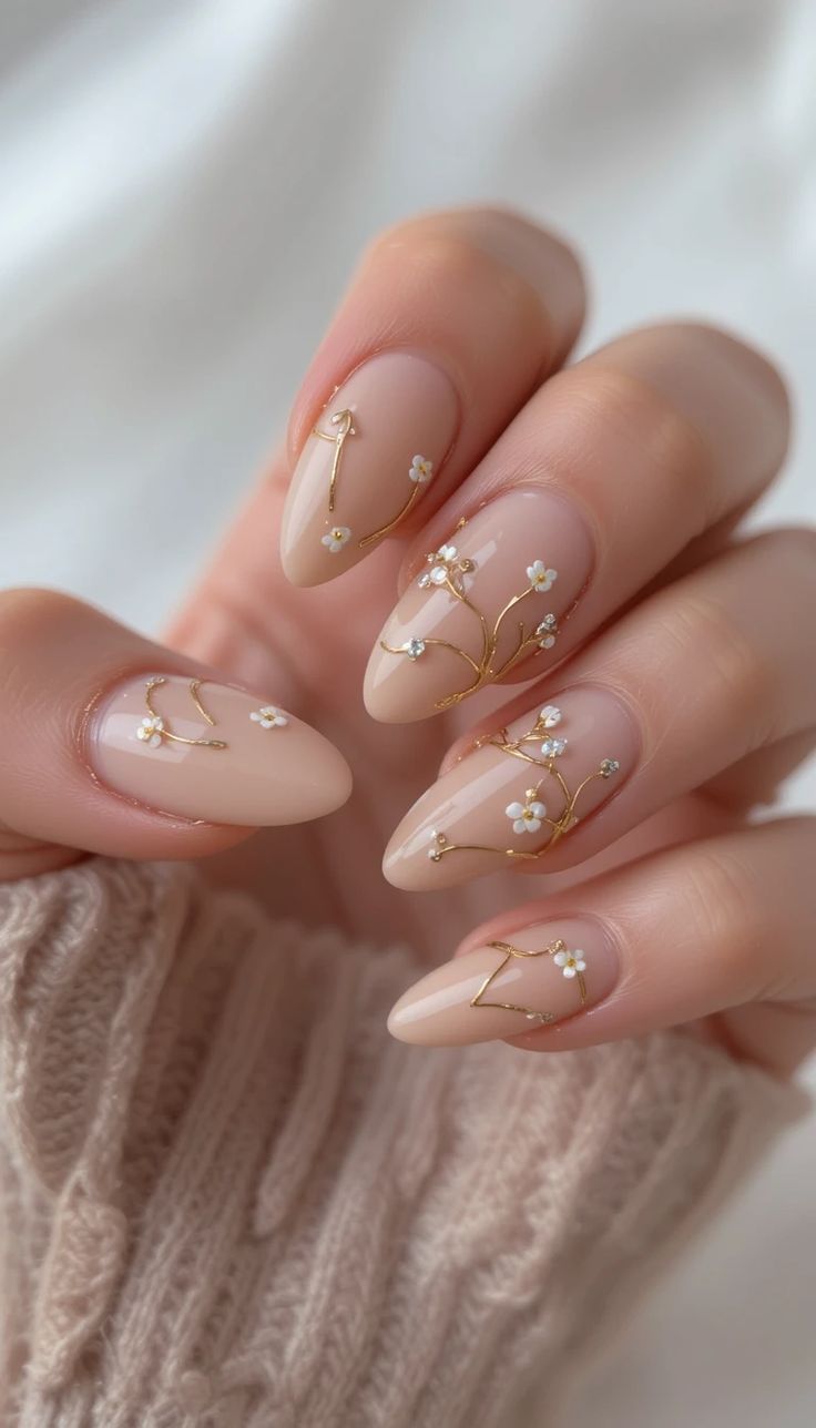 17 Elegant Nude Nail Art Ideas That Will Make You the Star of Every Occasion! - Gold Foil Accents