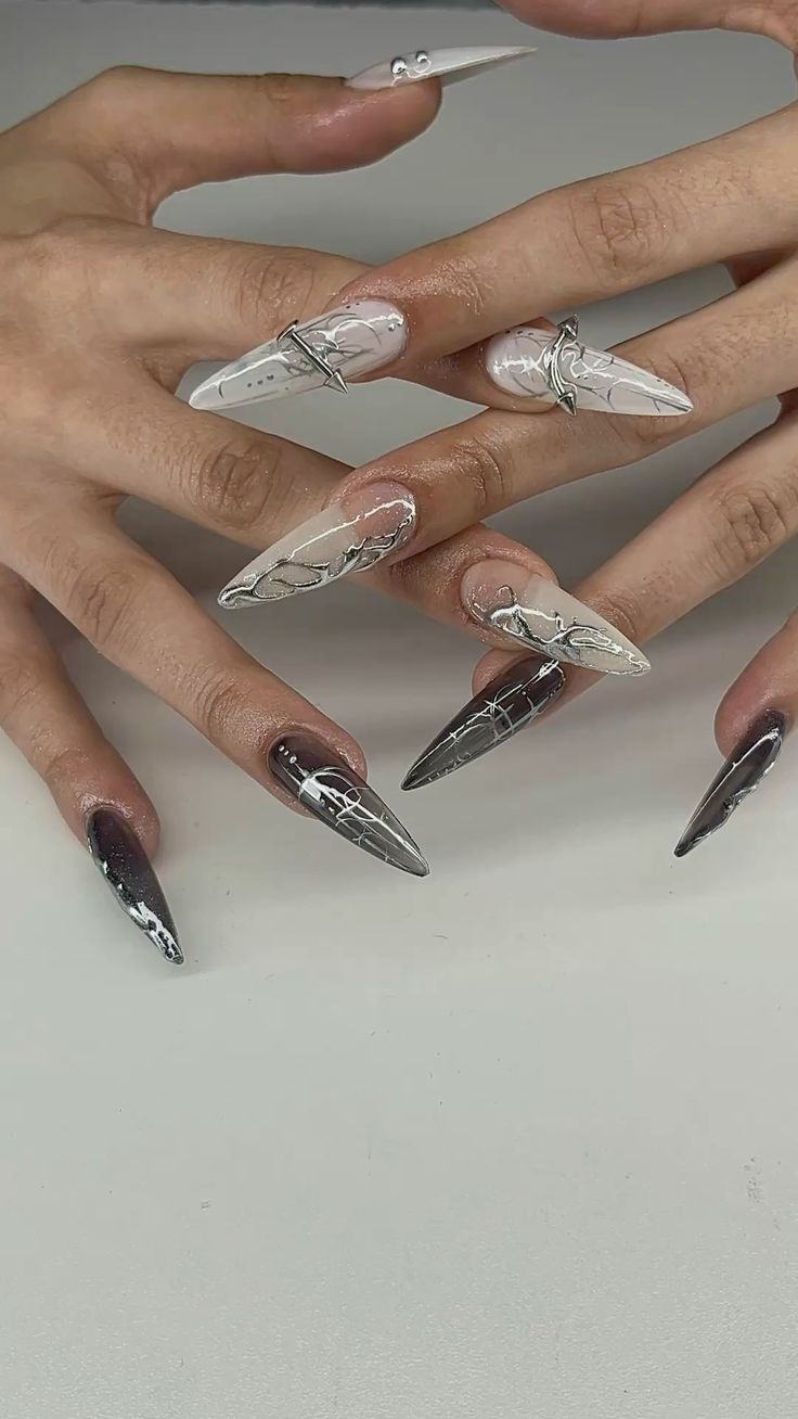 6 Soft Girl Stiletto Nail Designs You Must Try Before Summer Ends 🌞 - 2. Marble Magic: Soft White and Gray Stilettos