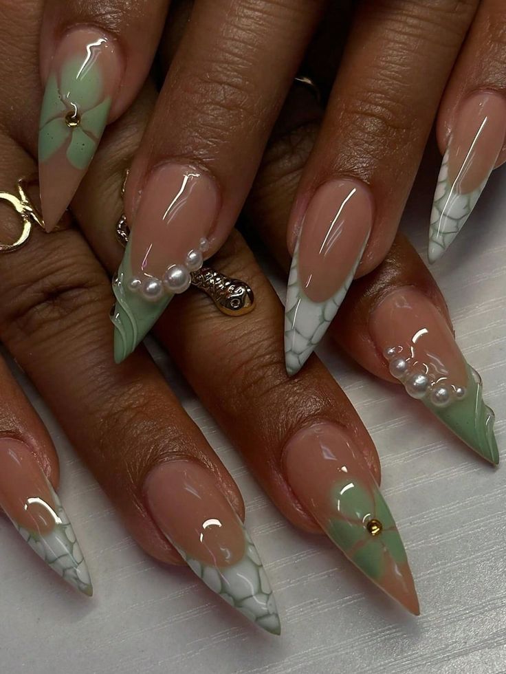 6 Soft Girl Stiletto Nail Designs You Must Try Before Summer Ends 🌞 - 3. Floral Fantasy: Green and White Stiletto Nails