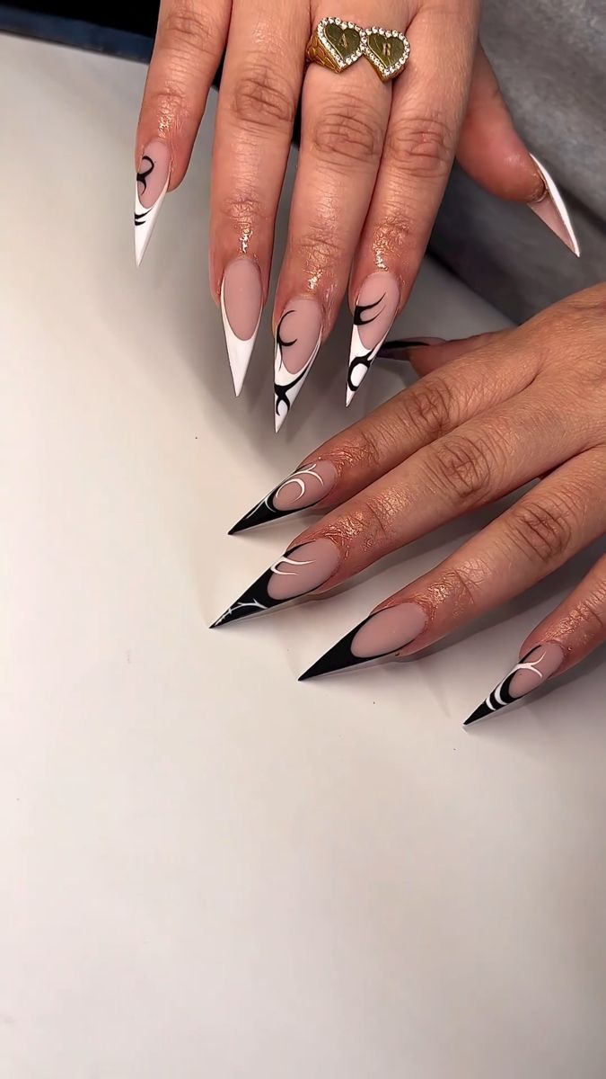 6 Soft Girl Stiletto Nail Designs You Must Try Before Summer Ends 🌞 - 6. Artistic Flair: Black and White Abstract Stiletto Nails