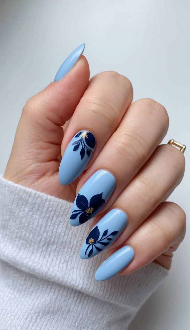 6 Stunning Blue Flower Nail Art Ideas You Need to Try Today! - 4. Bold Blue Floral Statement