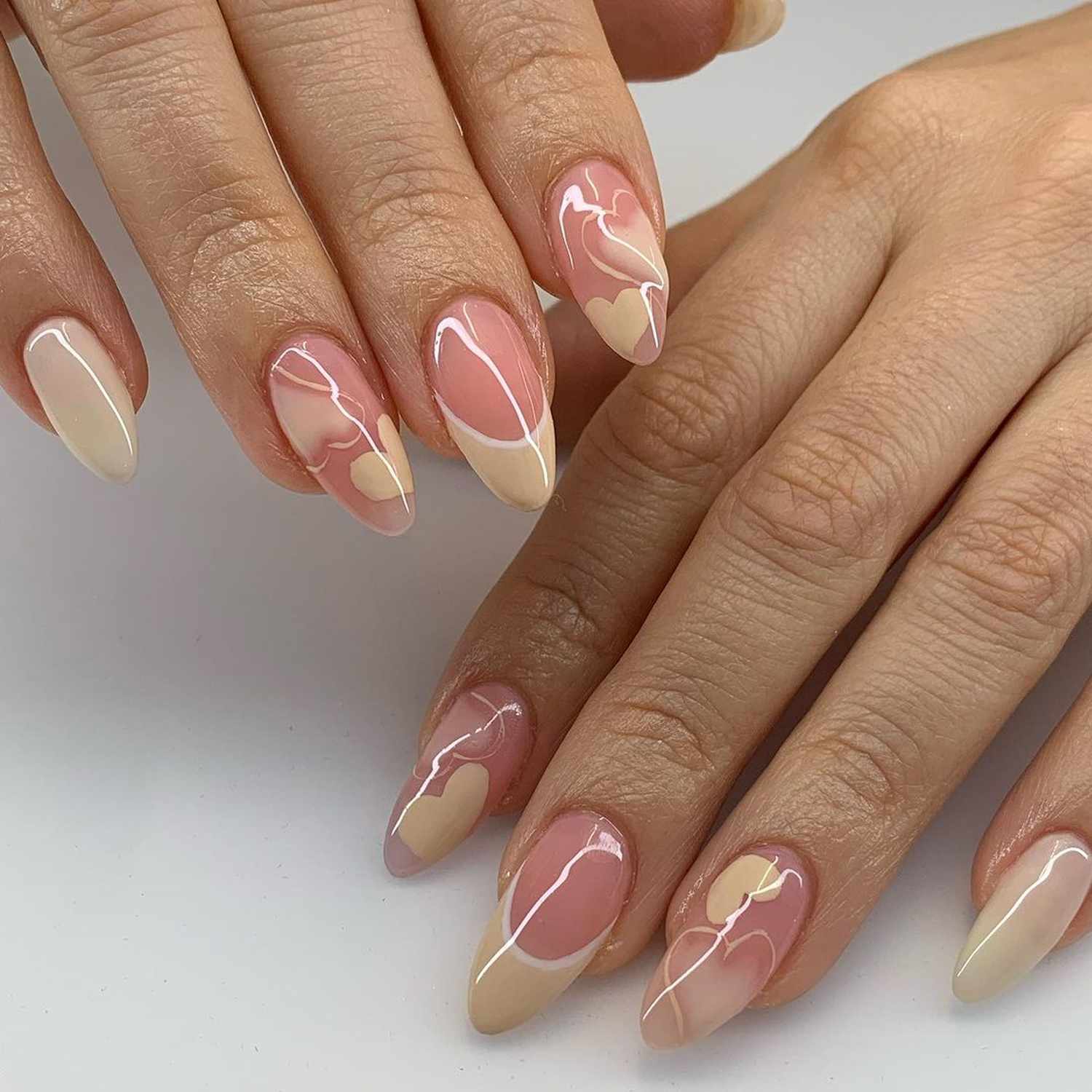 7 French Manicure Reinventions for Almond Nails This Summer 💫 - 3. Heartfelt French