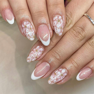 7 French Manicure Reinventions for Almond Nails This Summer 💫 - 4. Floral Fantasy